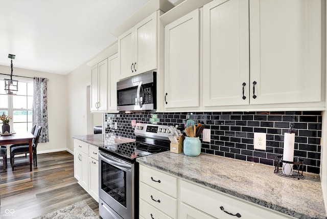 3301 N 200 W, Franklin, IN 46131 - kitchen with appliances with stainless steel finishes, tasteful backsplash, and white cabinets
