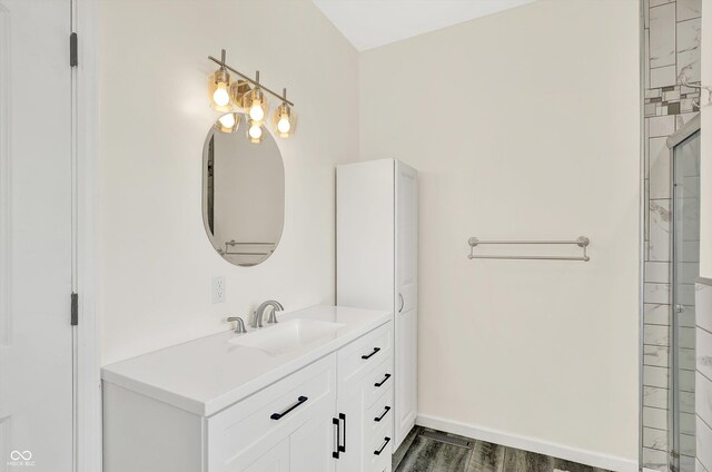 3301 N 200 W, Franklin, IN 46131 - bathroom featuring vanity, wood finished floors, a shower, and baseboards