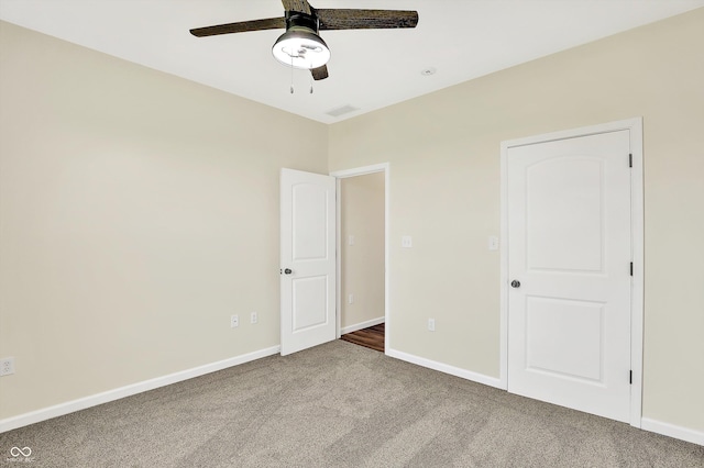 3301 N 200 W, Franklin, IN 46131 - unfurnished bedroom with carpet flooring, baseboards, and a ceiling fan