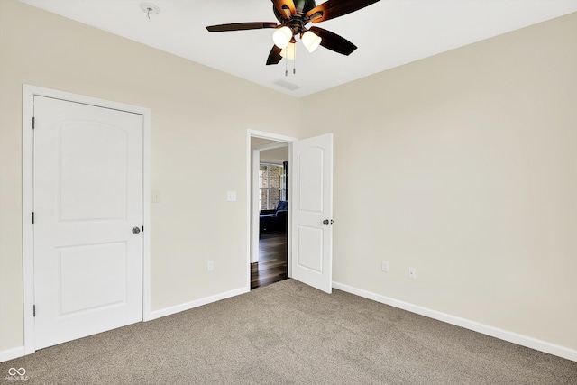 3301 N 200 W, Franklin, IN 46131 - unfurnished bedroom with carpet, baseboards, and ceiling fan
