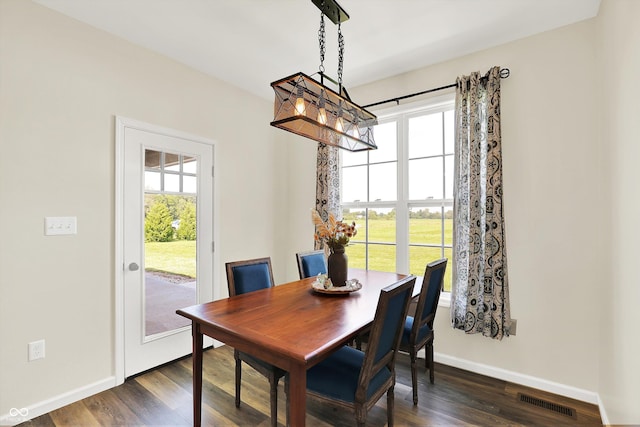 3301 N 200 W, Franklin, IN 46131 - dining room featuring baseboards, dark wood-type flooring, and a chandelier