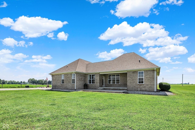 3301 N 200 W, Franklin, IN 46131 - rear view of house featuring brick siding, a yard, and a patio area