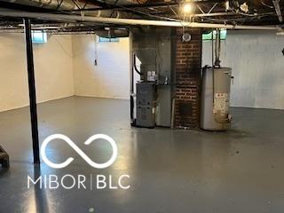 2028 Gilmore St, Columbus, IN 47201 - below grade area featuring gas water heater