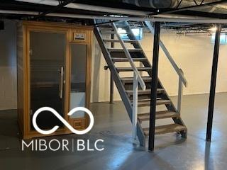 2028 Gilmore St, Columbus, IN 47201 - below grade area featuring stairs