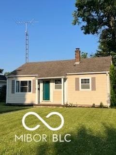 2028 Gilmore St, Columbus, IN 47201 - rear view of house with a yard and a chimney