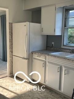 2028 Gilmore St, Columbus, IN 47201 - kitchen with freestanding refrigerator