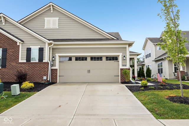 11429 Lottie Cir, Noblesville, IN 46060 - view of front of property with brick siding, driveway, and a garage