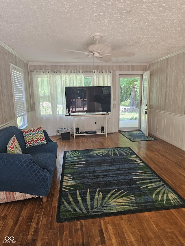 1317 S Ebert Dr, Rockville, IN 47872 - living area with a textured ceiling, ornamental molding, ceiling fan, and wood finished floors