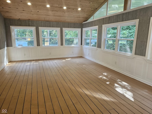 1317 S Ebert Dr, Rockville, IN 47872 - unfurnished sunroom featuring hardwood / wood-style flooring, recessed lighting, vaulted ceiling, and a deck