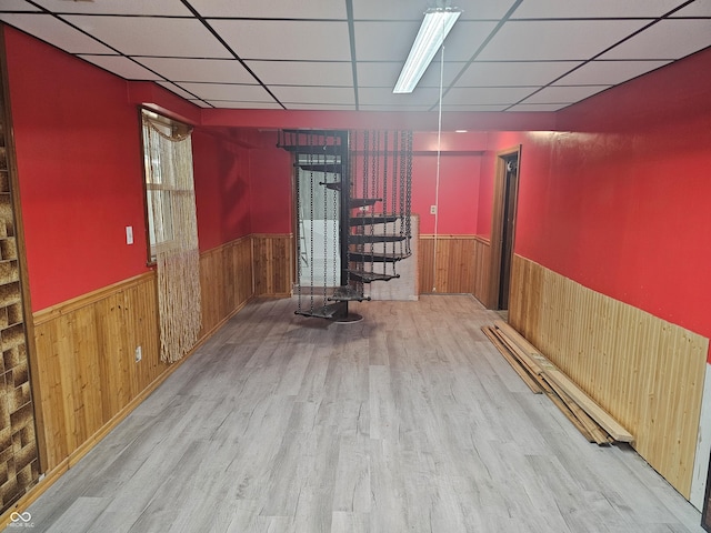 1317 S Ebert Dr, Rockville, IN 47872 - unfurnished room with wainscoting, wooden walls, wood finished floors, and a paneled ceiling