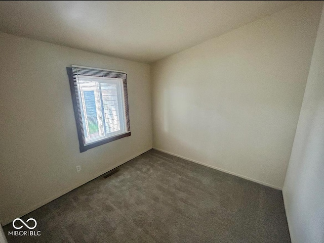 3161 Normandy Rd, Indianapolis, IN 46222 - empty room featuring dark colored carpet