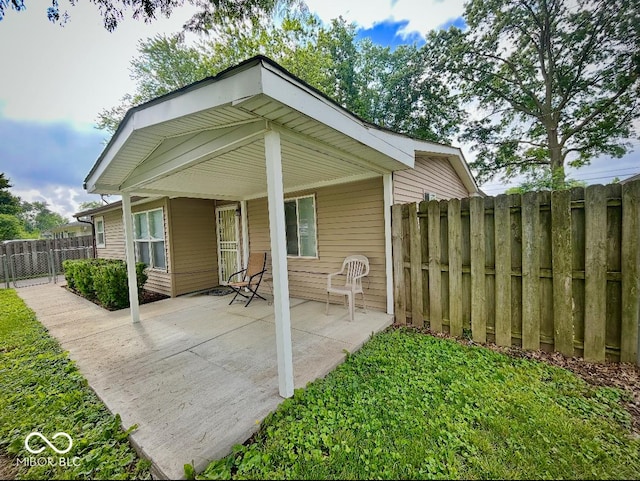 3161 Normandy Rd, Indianapolis, IN 46222 - rear view of house featuring a patio
