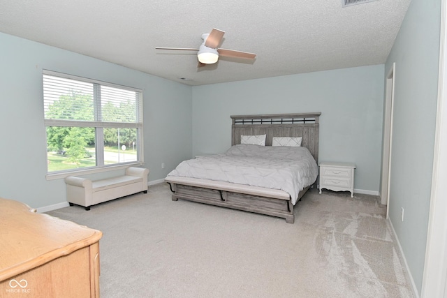 15524 Follow Dr, Noblesville, IN 46060 - bedroom with carpet floors, a textured ceiling, ceiling fan, and baseboards