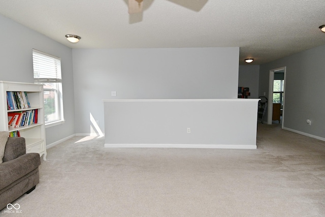 15524 Follow Dr, Noblesville, IN 46060 - spare room with light carpet, ceiling fan, and baseboards