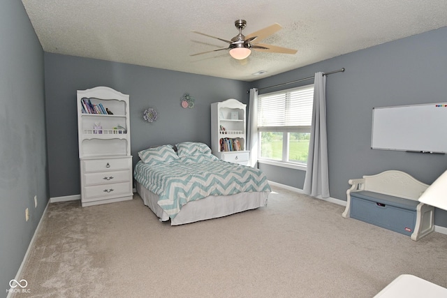 15524 Follow Dr, Noblesville, IN 46060 - bedroom featuring carpet flooring, baseboards, a textured ceiling, and ceiling fan