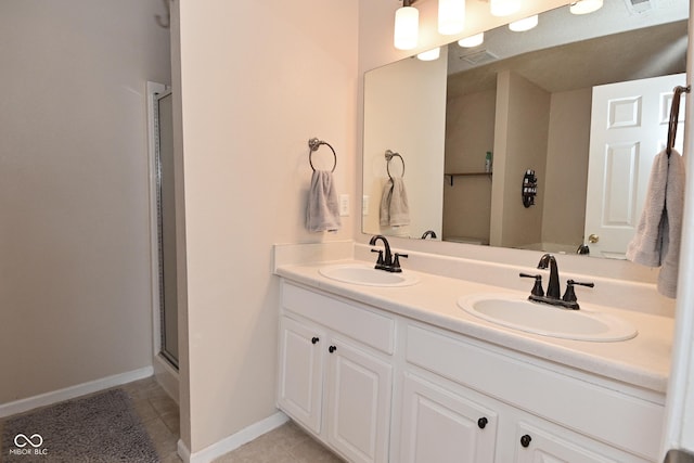 15524 Follow Dr, Noblesville, IN 46060 - full bath featuring double vanity, tile patterned flooring, a shower with door, and baseboards
