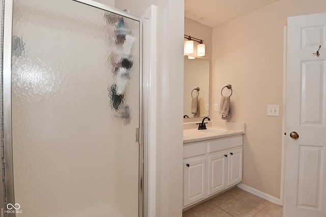 15524 Follow Dr, Noblesville, IN 46060 - full bath featuring tile patterned floors, a shower stall, vanity, and baseboards