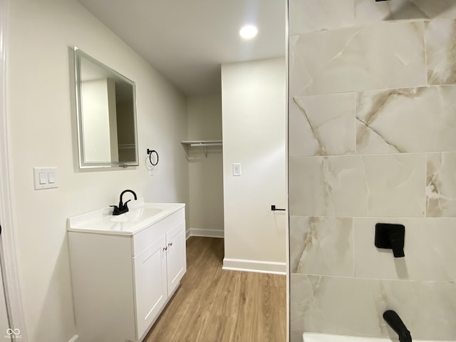 1429 Udell St, Indianapolis, IN 46208 - full bath with vanity, baseboards, wood finished floors, and recessed lighting
