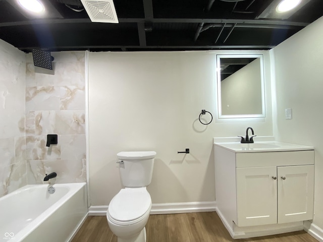 1429 Udell St, Indianapolis, IN 46208 - bathroom with wood finished floors, vanity, toilet, and shower / washtub combination