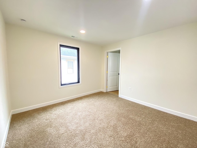 1429 Udell St, Indianapolis, IN 46208 - empty room with carpet, baseboards, and recessed lighting
