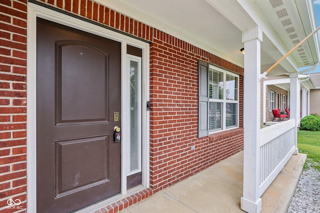 1739 Wedgewood Pl, Avon, IN 46123 - property entrance with a porch and brick siding