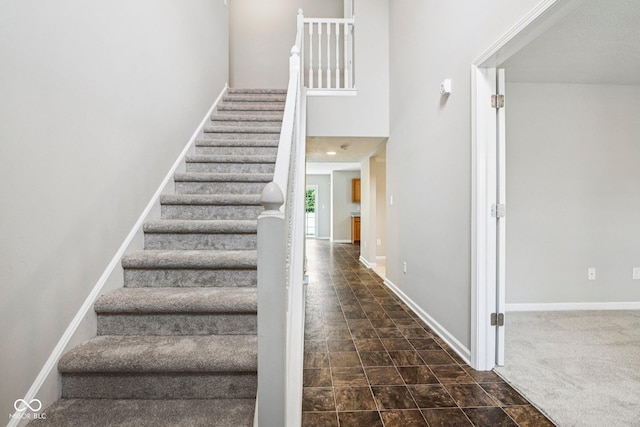 1739 Wedgewood Pl, Avon, IN 46123 - stairs featuring baseboards and a towering ceiling