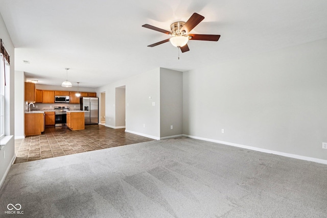 1739 Wedgewood Pl, Avon, IN 46123 - unfurnished living room with carpet flooring and ceiling fan