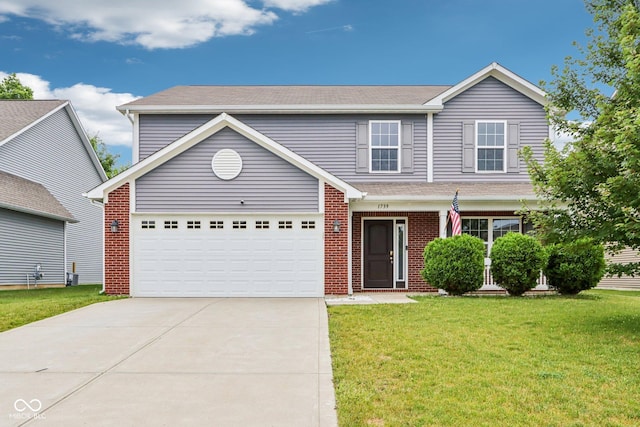 1739 Wedgewood Pl, Avon, IN 46123 - traditional-style house featuring a front yard, concrete driveway, and brick siding