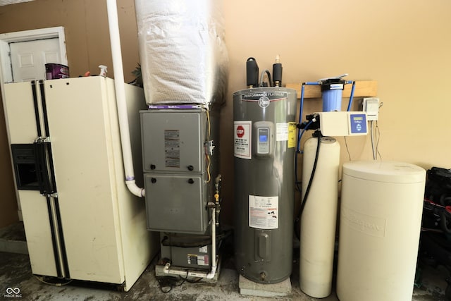 3119 W Burning Tree Rd, Crawfordsville, IN 47933 - utility room featuring electric water heater