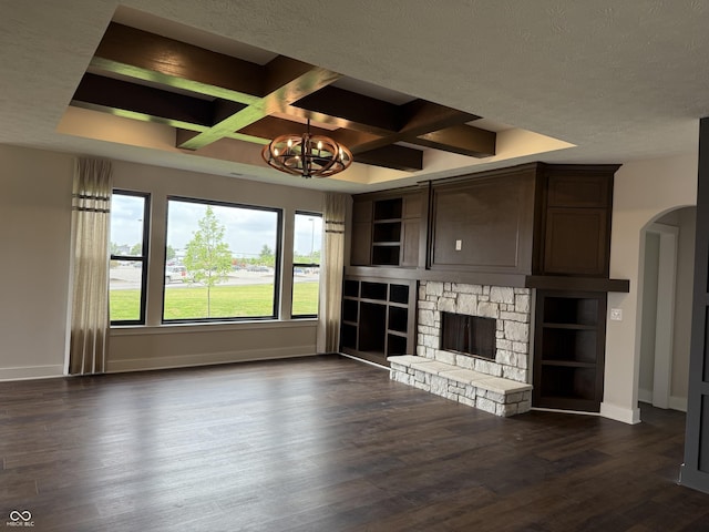 4995 S 650 W, Jamestown, IN 46147 - unfurnished living room with coffered ceiling, baseboards, arched walkways, dark wood-style flooring, and a fireplace