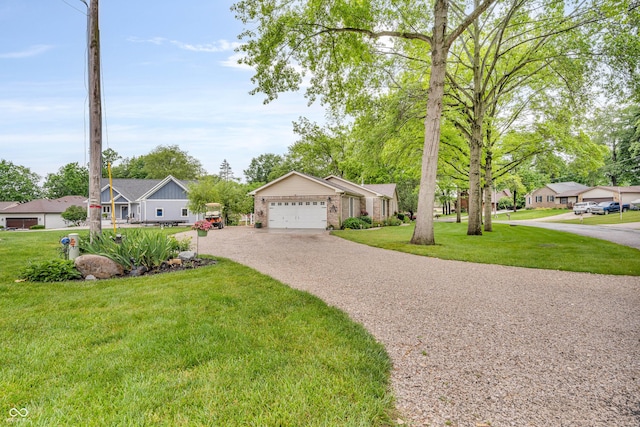 101 Jefferson Vly, Coatesville, IN 46121 - view of front of property featuring driveway, a front lawn, an attached garage, and a residential view