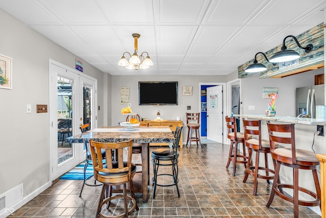 101 Jefferson Vly, Coatesville, IN 46121 - dining room with baseboards and a chandelier