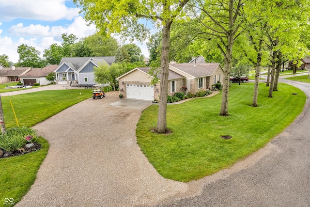 101 Jefferson Vly, Coatesville, IN 46121 - view of front of property with concrete driveway, a front yard, and a garage