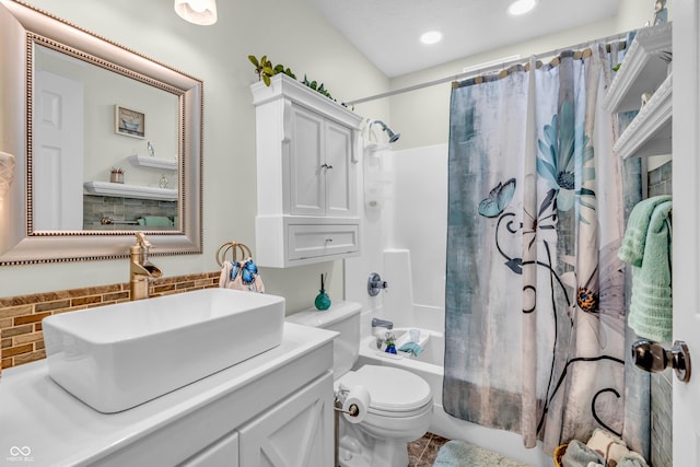 101 Jefferson Vly, Coatesville, IN 46121 - bathroom featuring shower / bath combo with shower curtain, vanity, backsplash, and recessed lighting