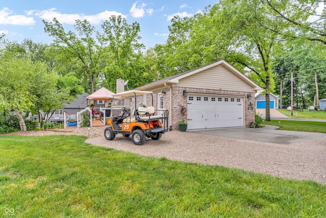 101 Jefferson Vly, Coatesville, IN 46121 - ranch-style house with a front lawn, concrete driveway, brick siding, and a chimney