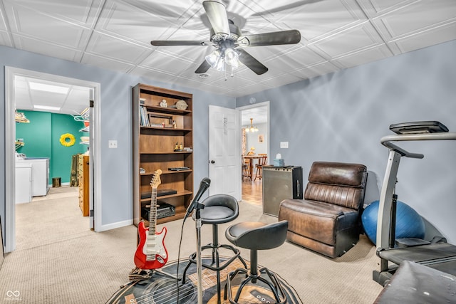 101 Jefferson Vly, Coatesville, IN 46121 - sitting room featuring light carpet, washing machine and clothes dryer, and ceiling fan