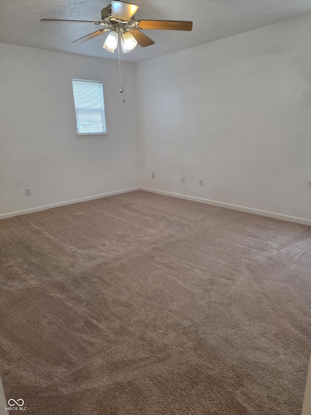 6368 Titania Dr, Indianapolis, IN 46236 - empty room featuring a ceiling fan, baseboards, and carpet floors