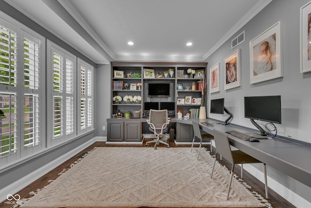 13304 Landwood Dr, Fishers, IN 46037 - office area with crown molding, wood finished floors, baseboards, built in study area, and recessed lighting