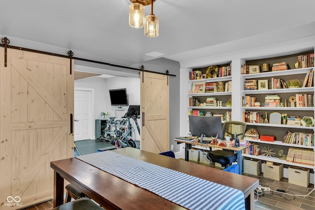 13304 Landwood Dr, Fishers, IN 46037 - office space with a barn door and wood finished floors