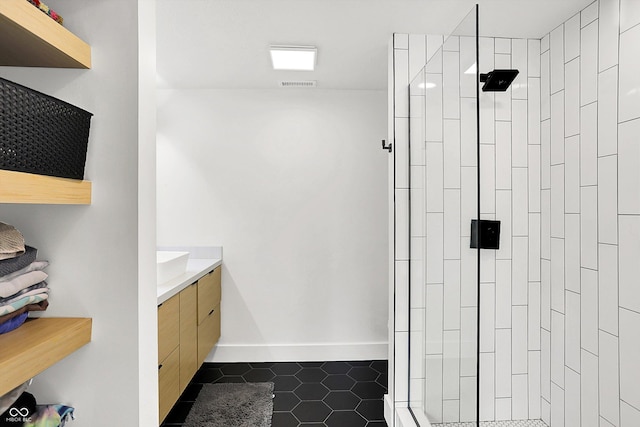 826 N Lanyard Dr, Cicero, IN 46034 - full bath featuring a shower stall, tile patterned floors, vanity, and baseboards