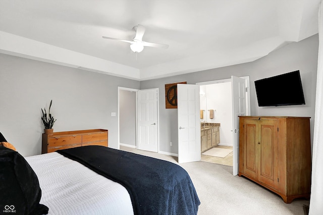 826 N Lanyard Dr, Cicero, IN 46034 - bedroom featuring light carpet, ensuite bath, ceiling fan, and baseboards