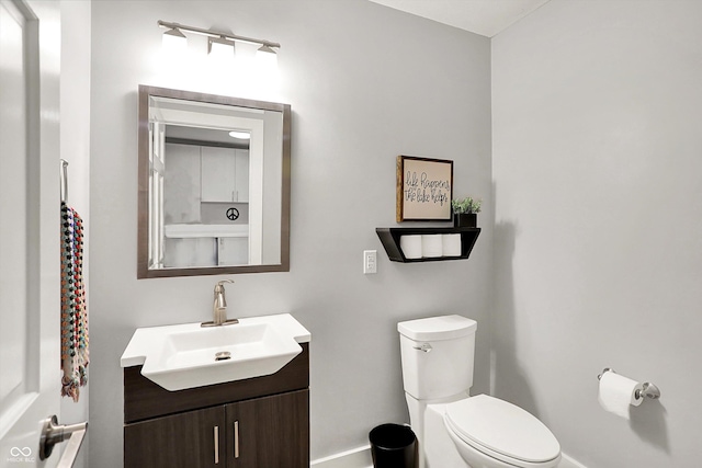 826 N Lanyard Dr, Cicero, IN 46034 - half bath with baseboards, toilet, and vanity