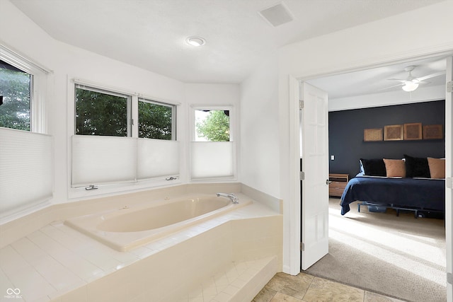 826 N Lanyard Dr, Cicero, IN 46034 - ensuite bathroom featuring a bath and ceiling fan