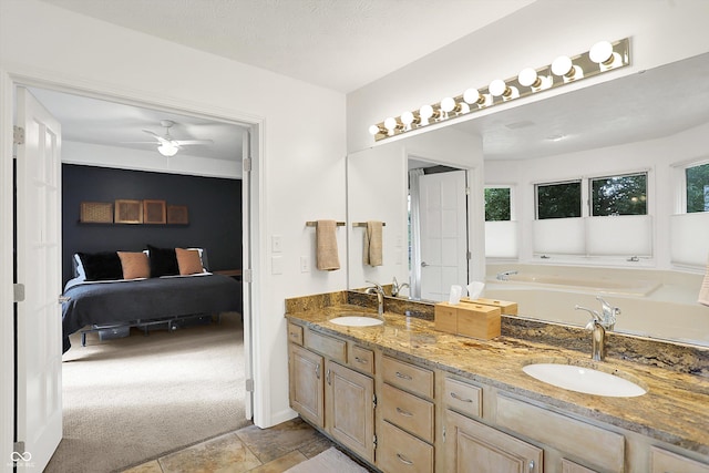 826 N Lanyard Dr, Cicero, IN 46034 - bathroom featuring connected bathroom, plenty of natural light, double vanity, and a garden tub