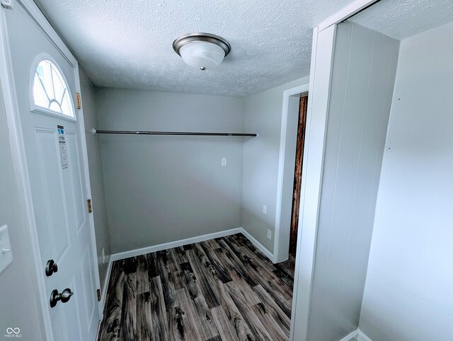 301 W Davis St, Greensburg, IN 47240 - walk in closet with dark wood-type flooring