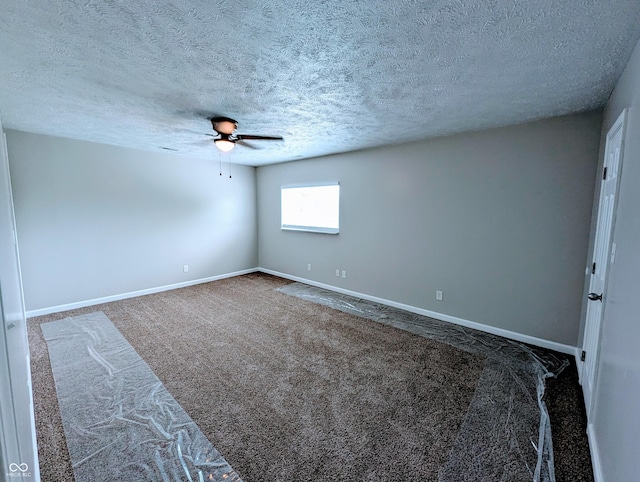 301 W Davis St, Greensburg, IN 47240 - spare room featuring ceiling fan, carpet flooring, baseboards, and a textured ceiling