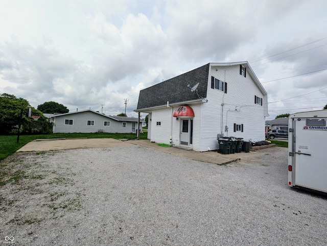 301 W Davis St, Greensburg, IN 47240 - rear view of property featuring a shingled roof
