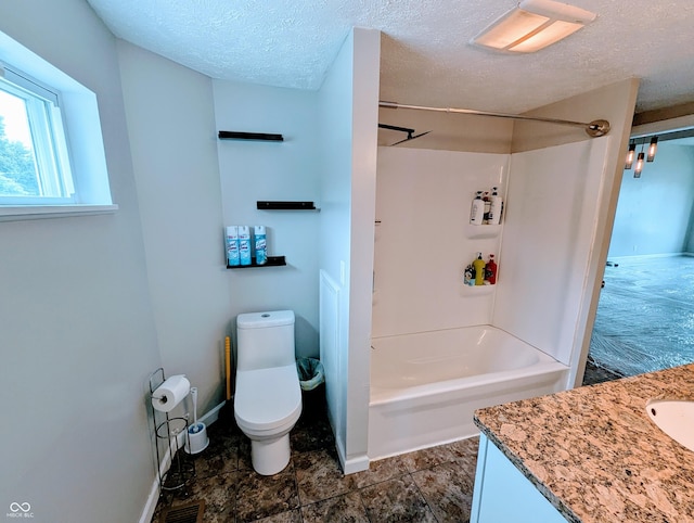 301 W Davis St, Greensburg, IN 47240 - full bathroom featuring toilet, vanity, washtub / shower combination, a textured ceiling, and baseboards