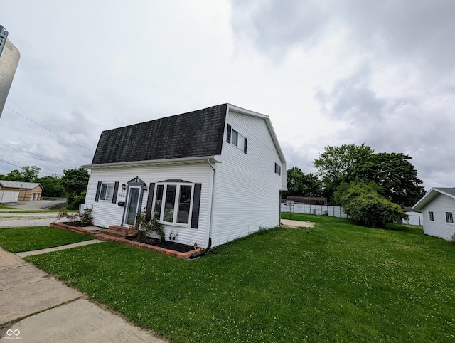 301 W Davis St, Greensburg, IN 47240 - view of front of house featuring roof with shingles and a gambrel roof