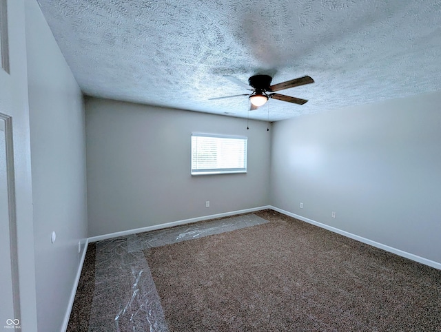 301 W Davis St, Greensburg, IN 47240 - unfurnished room with carpet, ceiling fan, a textured ceiling, and baseboards